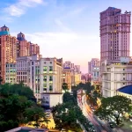 "Hiranandani Powai skyline with Powai Lake view at golden hour"